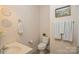 Small bathroom with toilet and single vanity at 5998 Village Nw Dr, Concord, NC 28027