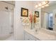 Clean bathroom with shower/tub combo and updated vanity at 5998 Village Nw Dr, Concord, NC 28027