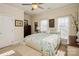 Spacious bedroom with large windows and plenty of natural light at 5998 Village Nw Dr, Concord, NC 28027