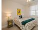 Bedroom with full-size bed, nightstand, and window at 5998 Village Nw Dr, Concord, NC 28027