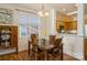 Dining room features a marble table and hardwood floors at 5998 Village Nw Dr, Concord, NC 28027