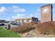 Building exterior and landscaping of community at 5998 Village Nw Dr, Concord, NC 28027