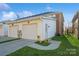 Attached two-car garage with additional storage at 5998 Village Nw Dr, Concord, NC 28027