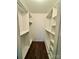 Large walk-in closet with ample shelving and hanging space at 6130 Heath Ridge Ct, Charlotte, NC 28210