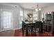 Breakfast nook with a table and chairs, near the kitchen and a view to the backyard at 8505 Delamere Ln, Charlotte, NC 28269