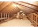 Unfinished attic space with wood beams and flooring at 936 23Rd Ne Ave, Hickory, NC 28601