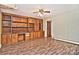 Finished basement with built-in shelving and wood floors at 936 23Rd Ne Ave, Hickory, NC 28601