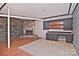 Basement with a built-in desk and tiled flooring at 936 23Rd Ne Ave, Hickory, NC 28601