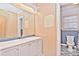 Bathroom with vanity, toilet and window at 936 23Rd Ne Ave, Hickory, NC 28601