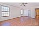Bedroom with hardwood floors, closets and bathroom access at 936 23Rd Ne Ave, Hickory, NC 28601