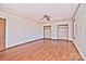 Spacious bedroom with wood flooring, ceiling fan, and double closets at 936 23Rd Ne Ave, Hickory, NC 28601