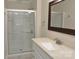 Simple bathroom with shower and white vanity with speckled countertop at 109 Shamrock Dr, Chester, SC 29706