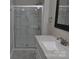 Updated bathroom with a large shower and white vanity at 109 Shamrock Dr, Chester, SC 29706