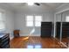 Spacious bedroom with hardwood floors and mirrored closet doors at 109 Shamrock Dr, Chester, SC 29706