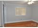 Bright bedroom with hardwood floors and a double window at 109 Shamrock Dr, Chester, SC 29706