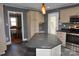 Kitchen with an island, stainless steel appliances, and dark counters at 109 Shamrock Dr, Chester, SC 29706
