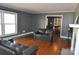 Living room with hardwood floors, fireplace and view into dining area at 109 Shamrock Dr, Chester, SC 29706