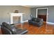 Living room with hardwood floors and fireplace at 109 Shamrock Dr, Chester, SC 29706