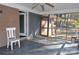 Screened porch with access to backyard and partial view of driveway at 109 Shamrock Dr, Chester, SC 29706