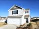 Two-story house with white siding, gray accents, and a two-car garage at 114 Lightning Dr, Shelby, NC 28152