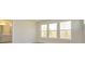 Primary bedroom features tray ceiling, carpeted floor, and an ensuite bathroom at 119 Quartz Hill Way, Waxhaw, NC 28173