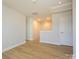 Loft bonus room with wood floors, recessed lighting, and ample space at 119 Quartz Hill Way, Waxhaw, NC 28173