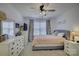 Bright bedroom with double bed, dresser, and ceiling fan at 1224 Regions Blvd, Fort Mill, SC 29707