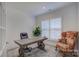 Bright home office featuring a large window and comfortable seating at 1224 Regions Blvd, Fort Mill, SC 29707