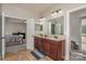 Double vanity bathroom with lots of counter space at 15049 Easywater Ln, Charlotte, NC 28278