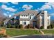 Stunning two-story home boasts a beautifully landscaped front yard and elegant architectural details at 15618 Frohock Pl, Charlotte, NC 28277
