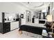 Spacious bedroom with a mirrored wall, sleek furnishings, and modern design at 15618 Frohock Pl, Charlotte, NC 28277