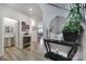 Bright entryway features wood floors and a decorative console table at 18022 Stark Way, Charlotte, NC 28278