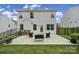 A home's backyard and patio featuring space for outdoor seating and activities at 18022 Stark Way, Charlotte, NC 28278