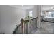 Hallway with a staircase and a view of the bedroom at 18022 Stark Way, Charlotte, NC 28278