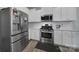Well-equipped kitchen with stainless steel appliances and ample counter space at 18022 Stark Way, Charlotte, NC 28278