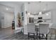 Stylish kitchen featuring a breakfast bar with pendant lighting at 18022 Stark Way, Charlotte, NC 28278