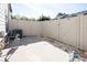 Private backyard with gravel patio and vinyl fence at 318 Willow Wood Ct, Matthews, NC 28104