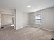 Bright bedroom with neutral walls, carpet flooring, and window with blinds at 350 Orr Dr, Rock Hill, SC 29730