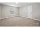 Simple bedroom with new carpet and a window at 350 Orr Dr, Rock Hill, SC 29730