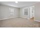 Bedroom with two windows, neutral walls, and carpet at 350 Orr Dr, Rock Hill, SC 29730