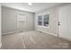 Bright bedroom with new carpet, neutral walls, and two windows at 350 Orr Dr, Rock Hill, SC 29730
