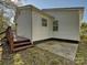 Side view of the house showing a wooden deck and concrete patio at 350 Orr Dr, Rock Hill, SC 29730