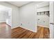 Laundry area with washer and dryer hookups, shelving and wood-look flooring at 350 Orr Dr, Rock Hill, SC 29730