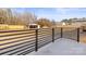 Spacious backyard with shed and modern railing at 3722 Unionville Indian Trail W Rd, Indian Trail, NC 28079