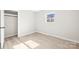 Bright bedroom with wood-look floors and spacious closet at 3722 Unionville Indian Trail W Rd, Indian Trail, NC 28079