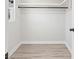 Spacious closet with wood flooring and hanging rod at 3722 Unionville Indian Trail W Rd, Indian Trail, NC 28079