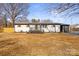 Charming single-story home featuring a light exterior with modern updates and a well-maintained yard at 3722 Unionville Indian Trail W Rd, Indian Trail, NC 28079