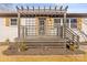 Charming front porch with pergola, wooden deck, and modern railings at 3722 Unionville Indian Trail W Rd, Indian Trail, NC 28079