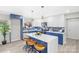 Modern kitchen with blue cabinets, white countertops, and a large island at 3722 Unionville Indian Trail W Rd, Indian Trail, NC 28079