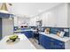 Updated kitchen featuring blue and white cabinets and stainless steel appliances at 3722 Unionville Indian Trail W Rd, Indian Trail, NC 28079